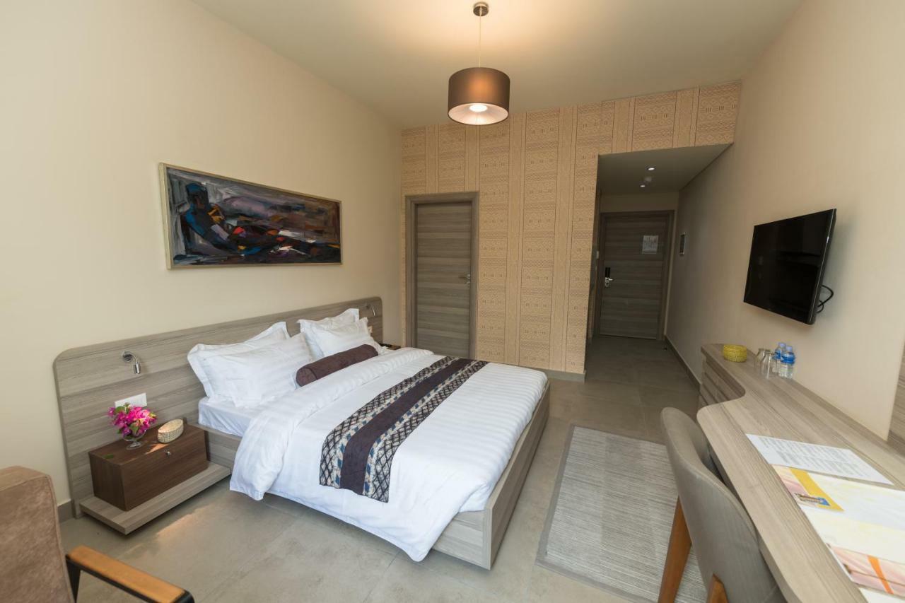 Roots Hotel Apartments 阿比让 外观 照片